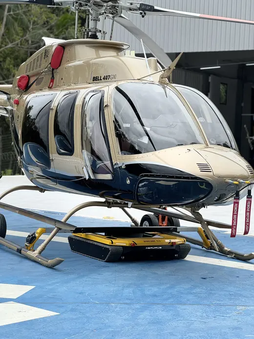 Bell skid helicopter on the AEROTANK on the helipad