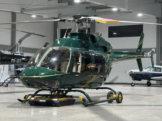 AEROTANK under the skids of a Bell helicopter inside the hangar